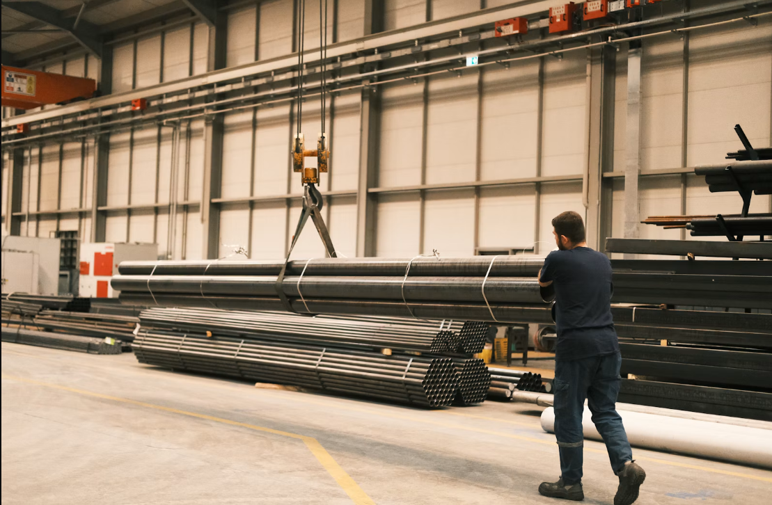 Steel pipes arranged in an industrial storage area